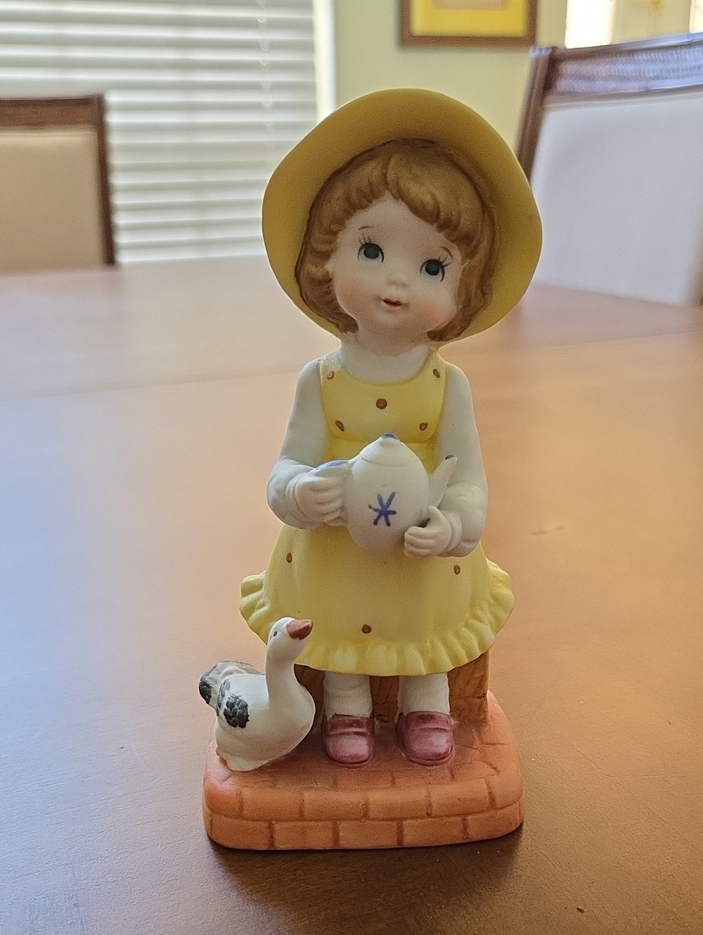 Yellow Hat Girl Figurine with Teapot and Goose